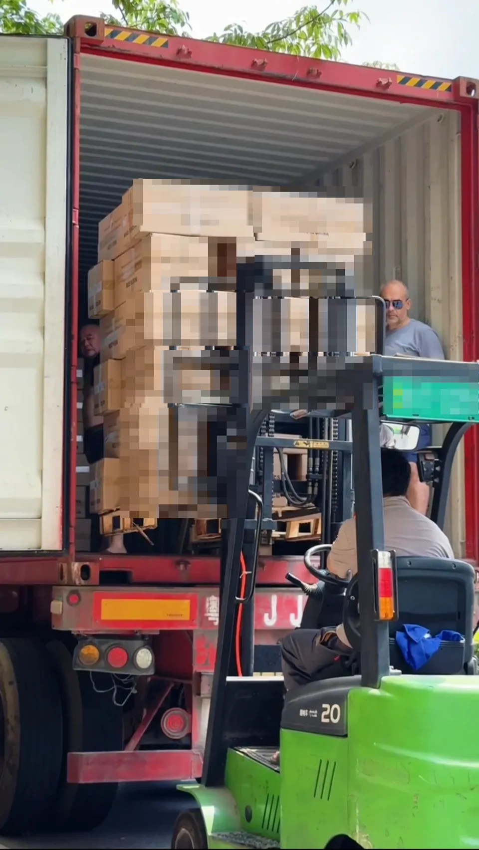 Cartons moved into the container